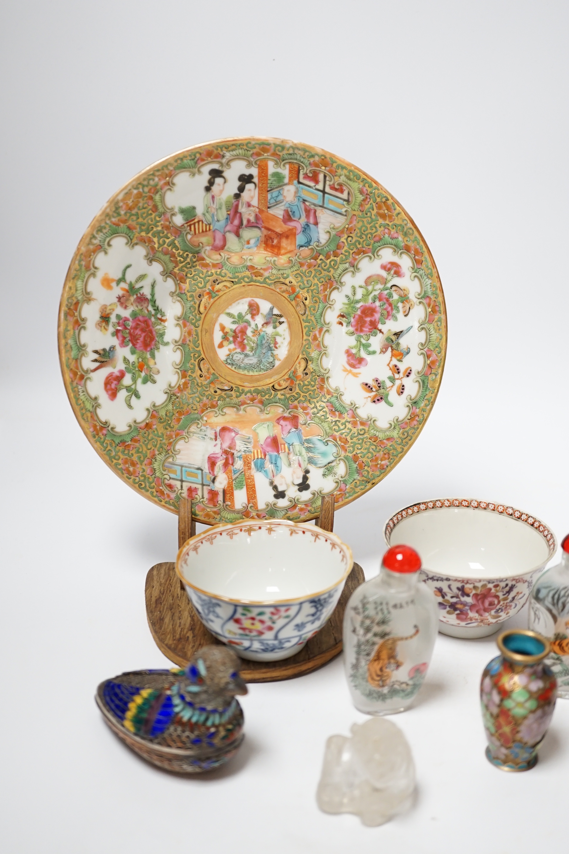 A collection of mixed Chinese scent bottles a famille rose plate and two tea bowls together with various Japanese items